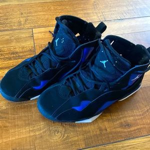 Pair of Nike 7.5 Jordan Black and Royal True Flights.